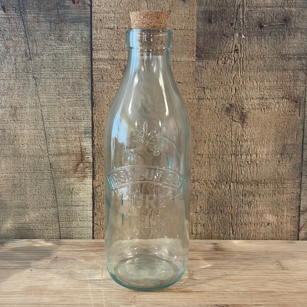 Vintage Absolutely Pure Milk Embossed Cow Bottle